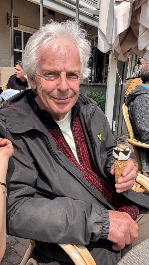 A man enjoying an ice cream on the terrace